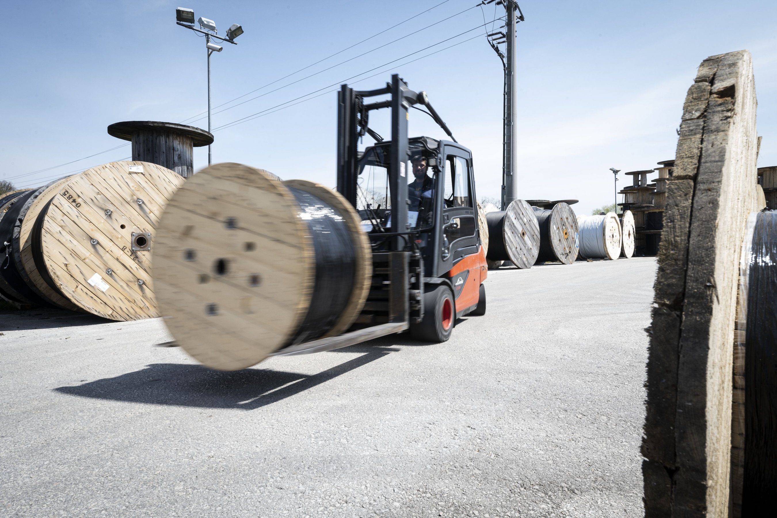 Outside warehouse forklift in motion